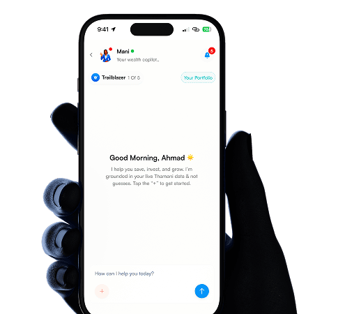 Hand holding Thamani app